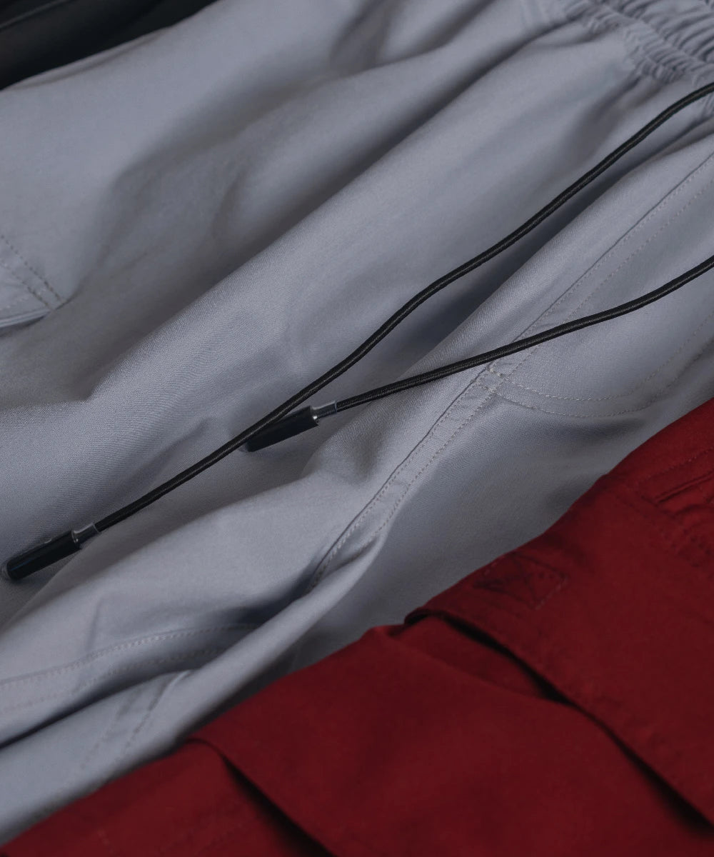 Pantaloneta functional gris